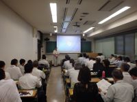 第1回報告会講演会、柏崎幹事長の開会挨拶